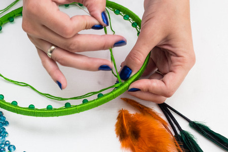 set for making a Dreamcatcher, beads, thread on a white backgroundの写真素材
