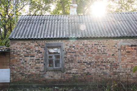 an image of old window on red brick wallの写真素材