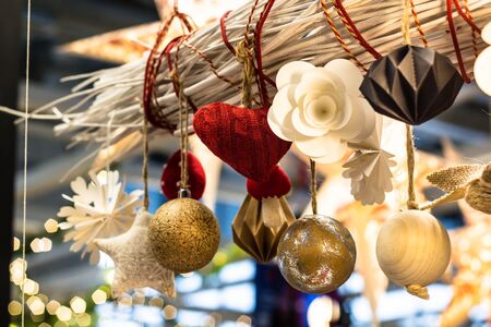Christmas New Year's toys in the form of heart, balls, flowers, stars and tree branches