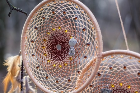 Red black and purple Dreamcatcher with bat made of feathers leather beads and ropes, hanging