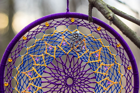 Red black and purple Dreamcatcher with bat made of feathers leather beads and ropes, hanging