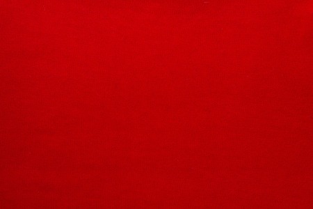 The texture of a knitted woolen fabric red. Backgroundの写真素材