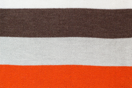 colorful sweater thread texture background ,Multicolor front loops of wool yarn knitted backgroundの写真素材