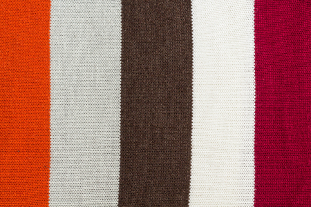 colorful sweater thread texture background ,Multicolor front loops of wool yarn knitted backgroundの写真素材