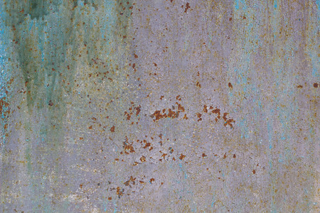 Corroded metal background. Rusted painted metal wall corrosion with streaks of rustの写真素材