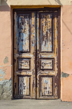 Old wooden brown house door in Russiaの写真素材