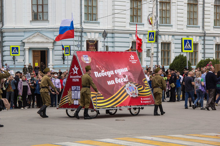 NOVOCHERKASSK, RUSSIA - MAY 9, 2017 - Victory Day: The immortal regiment parade in the centre of the city of Novocherkassk. People with portraits of the victims of the Second World war.のeditorial素材