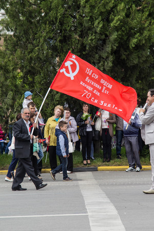 NOVOCHERKASSK, RUSSIA - MAY 9, 2017 - Victory Day: The immortal regiment parade in the centre of the city of Novocherkassk. People with portraits of the victims of the Second World war.のeditorial素材