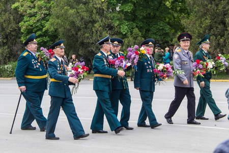 NOVOCHERKASSK, RUSSIA - MAY 9, 2017 - Victory Day: The immortal regiment parade in the centre of the city of Novocherkassk. People with portraits of the victims of the Second World war.のeditorial素材