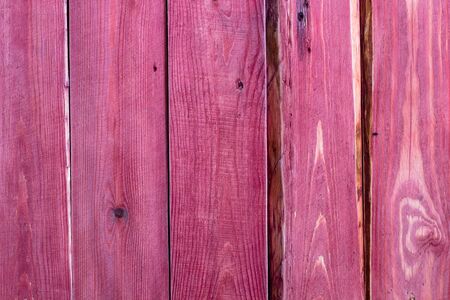 Wooden striped surface of pink color, texture or backgroundの写真素材