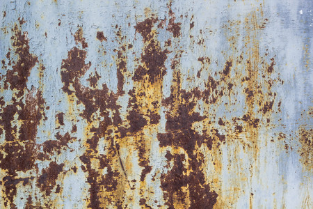 Corroded metal background. Rusted painted metal wall corrosion with streaks of rustの写真素材
