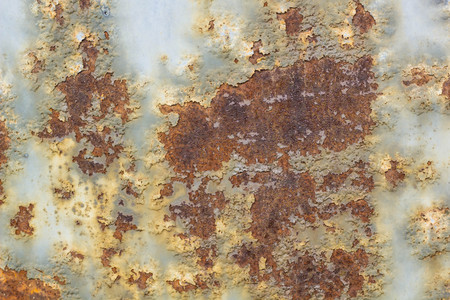 Corroded metal background. Rusted painted metal wall corrosion with streaks of rustの写真素材