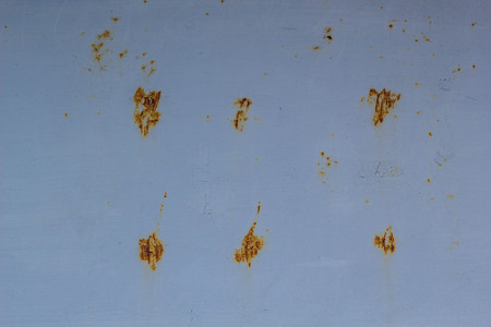 Corroded metal background. Rusted painted metal wall corrosion with streaks of rustの写真素材