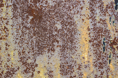 Corroded metal background. Rusted painted metal wall corrosion with streaks of rustの写真素材