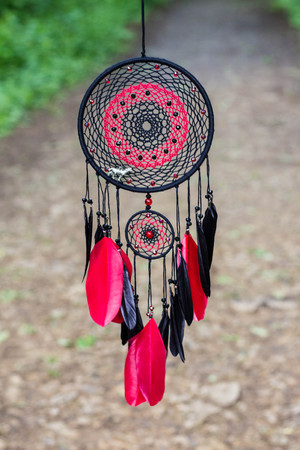 Dream catcher with feathers threads and beads rope hanging. Dreamcatcher handmadeの写真素材