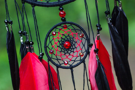 Dream catcher with feathers threads and beads rope hanging. Dreamcatcher handmadeの写真素材