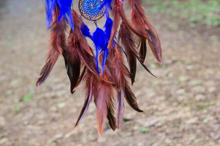 Dream catcher with feathers threads and beads rope hanging. Dreamcatcher handmadeの写真素材