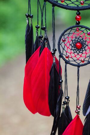 Dream catcher with feathers threads and beads rope hanging. Dreamcatcher handmadeの写真素材