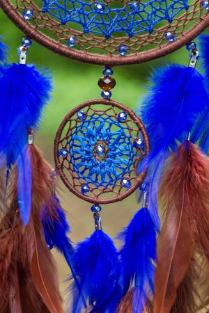Dream catcher with feathers threads and beads rope hanging. Dreamcatcher handmadeの写真素材