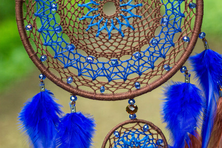 Dream catcher with feathers threads and beads rope hanging. Dreamcatcher handmadeの写真素材