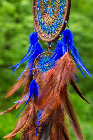 Dream catcher with feathers threads and beads rope hanging. Dreamcatcher handmadeの写真素材