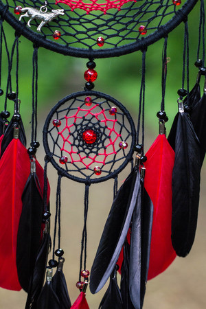 Dream catcher with feathers threads and beads rope hanging. Dreamcatcher handmadeの写真素材