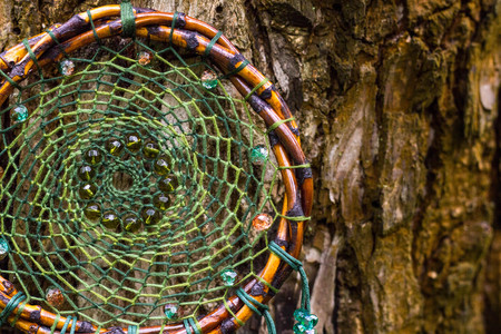 Dream catcher with feathers threads and beads rope hanging. Dreamcatcher handmade