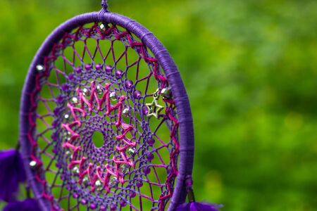 Dream catcher with feathers threads and beads rope hanging. Dreamcatcher handmadeの写真素材