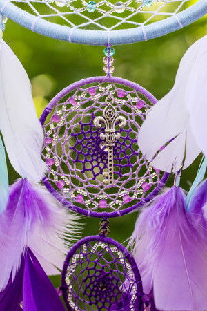Dream catcher with feathers threads and beads rope hanging. Dreamcatcher handmadeの写真素材