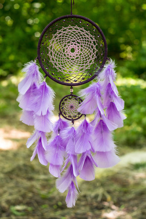 Dream catcher with feathers threads and beads rope hanging. Dreamcatcher handmadeの写真素材