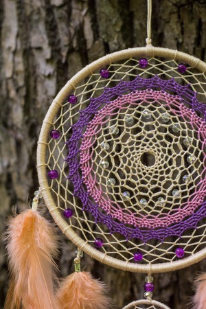 Dream catcher with feathers threads and beads rope hanging. Dreamcatcher handmadeの写真素材