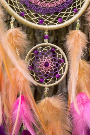 Dream catcher with feathers threads and beads rope hanging. Dreamcatcher handmadeの写真素材