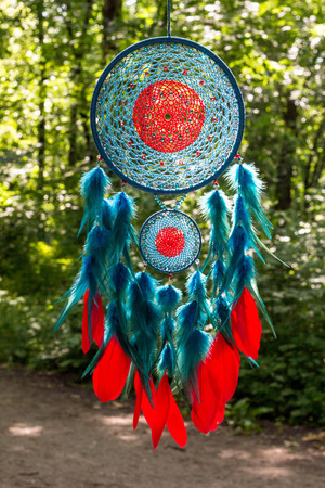 Dream catcher with feathers threads and beads rope hanging. Dreamcatcher handmadeの写真素材