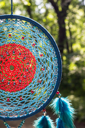 Dream catcher with feathers threads and beads rope hanging. Dreamcatcher handmadeの写真素材