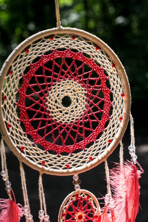 Dream catcher with feathers threads and beads rope hanging. Dreamcatcher handmadeの写真素材