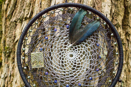 Dream catcher with feathers threads and beads rope hanging. Dreamcatcher handmadeの写真素材