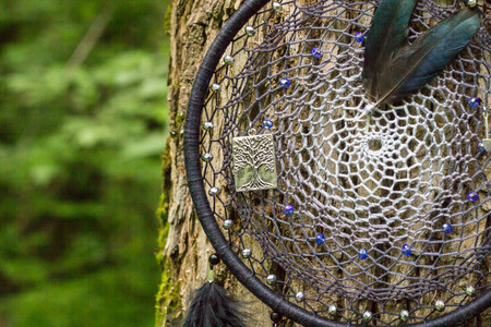 Dream catcher with feathers threads and beads rope hanging. Dreamcatcher handmadeの写真素材