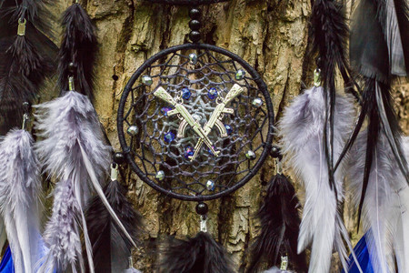Dream catcher with feathers threads and beads rope hanging. Dreamcatcher handmadeの写真素材