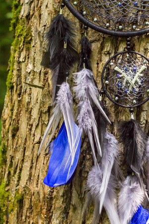 Dream catcher with feathers threads and beads rope hanging. Dreamcatcher handmadeの写真素材