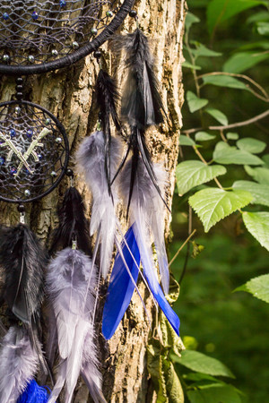 Dream catcher with feathers threads and beads rope hanging. Dreamcatcher handmadeの写真素材