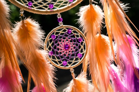 Dream catcher with feathers threads and beads rope hanging. Dreamcatcher handmadeの写真素材