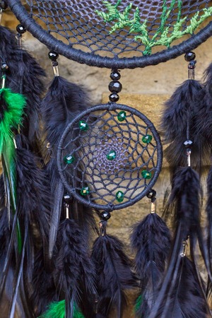 Dream catcher with feathers threads and beads rope hanging. Dreamcatcher handmadeの写真素材
