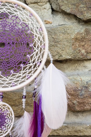 Dream catcher with feathers threads and beads rope hanging. Dreamcatcher handmadeの写真素材