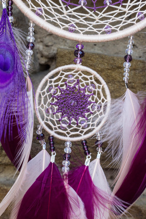 Dream catcher with feathers threads and beads rope hanging. Dreamcatcher handmadeの写真素材