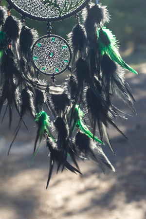 Dream catcher with feathers threads and beads rope hanging. Dreamcatcher handmadeの写真素材