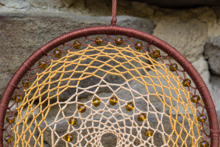 Dream catcher with feathers threads and beads rope hanging. Dreamcatcher handmadeの写真素材