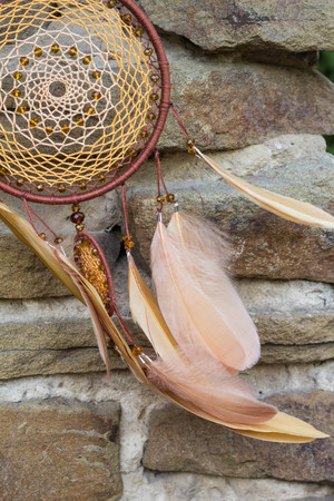 Dream catcher with feathers threads and beads rope hanging. Dreamcatcher handmadeの写真素材