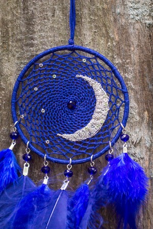 Dream catcher with feathers threads and beads rope hanging. Dreamcatcher handmadeの写真素材
