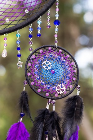 Dream catcher with feathers threads and beads rope hanging. Dreamcatcher handmadeの写真素材