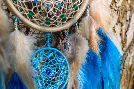 Dream catcher with feathers threads and beads rope hanging. Dreamcatcher handmadeの写真素材